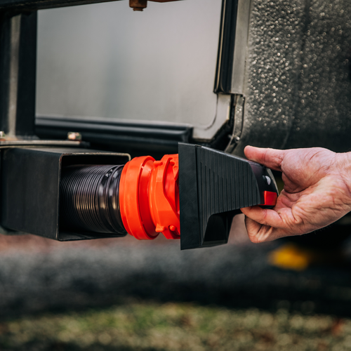 Camco 40332 RV Bumper Cap Solar Light Being Installed on Square RV Bumper - Installation Shot | United RV Parts