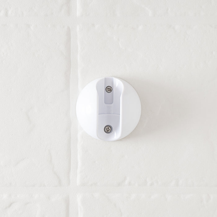 White Round RV Shower Head Wall Mount Bracket with Screws Installed on Tile - Close-Up Detail | United RV Parts
