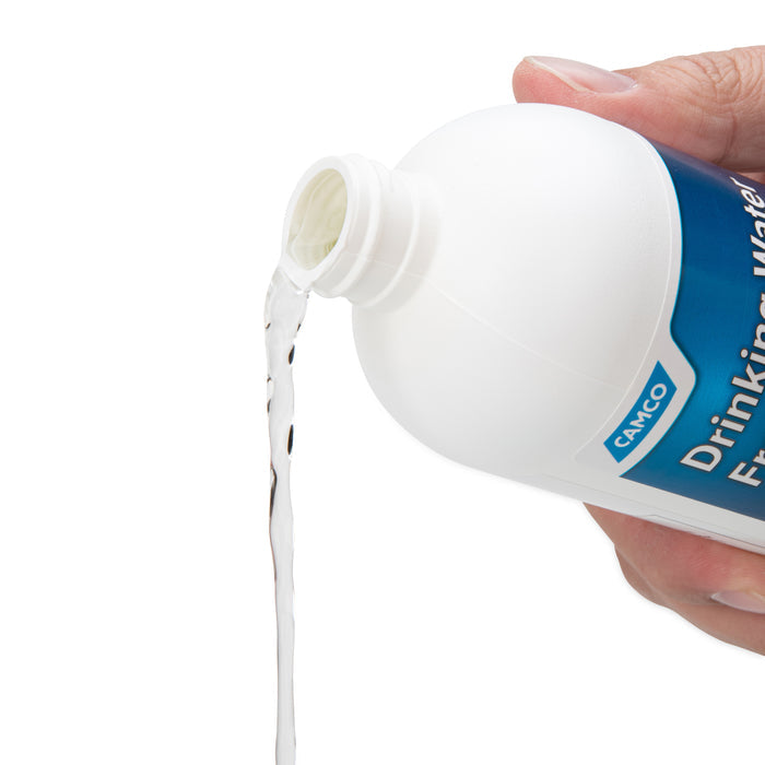 Camco Water Freshener Pouring Action - Close-up Detail of Liquid Application | United RV Parts