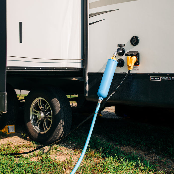 Blue RV Water Filter Connected to Travel Trailer - Installation View | United RV Parts