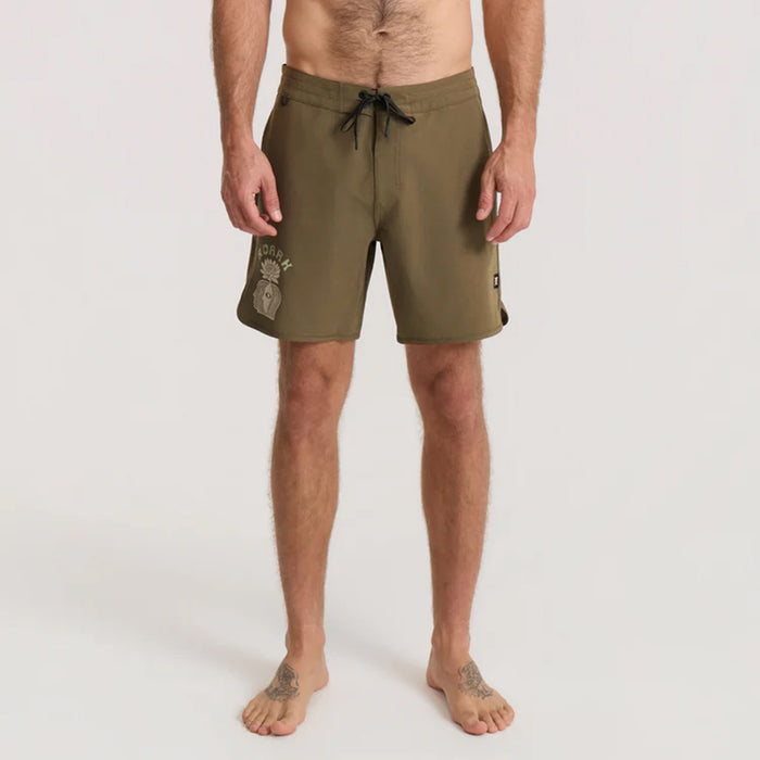 Roark adventure-ready boardshorts displayed in a travel-inspired tropical setting, ideal for exploring and relaxing on vacation.