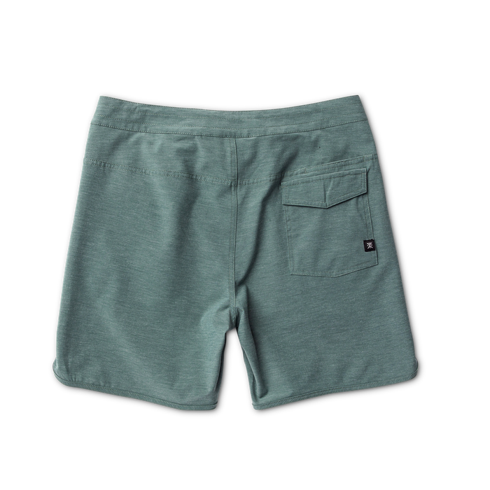 Stylish Roark boardshorts in green hanging casually, ready for outdoor and adventure travels