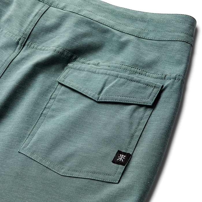 Roark adventure-ready boardshorts displayed against a rugged outdoor backdrop, perfect for surfing or exploration.