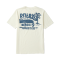 Active shirt with palm tree backdrop, embodying Roark's spirit of adventure and travel