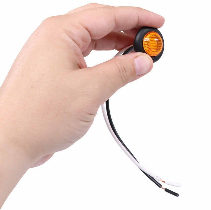 Amber 3/4 Inch RV LED Bullet Light Hand Size Comparison - Compact Marker Light | United RV Parts