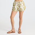 Bermuda shorts ideal for adventure and travel, showcased in a natural outdoor setting.