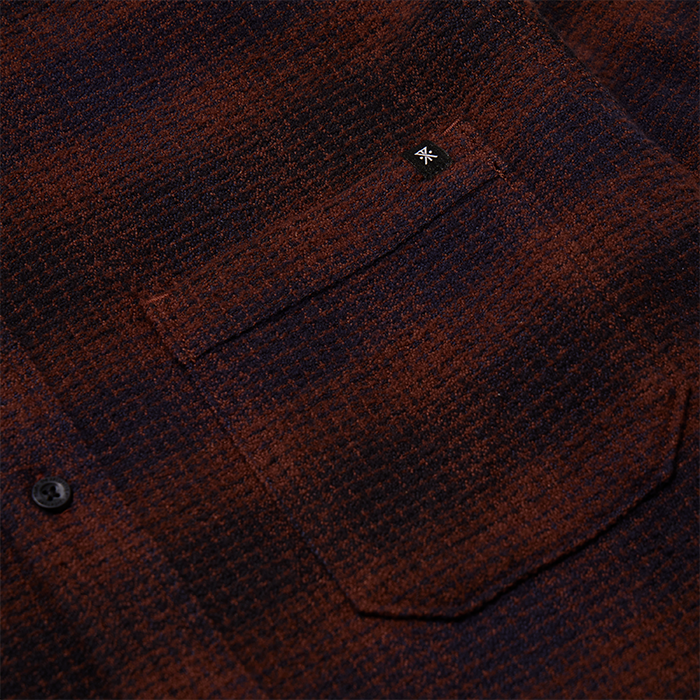 Rich brown textured background invoking the earthy tones of an outdoor adventure, perfect for Roark-inspired explorations.