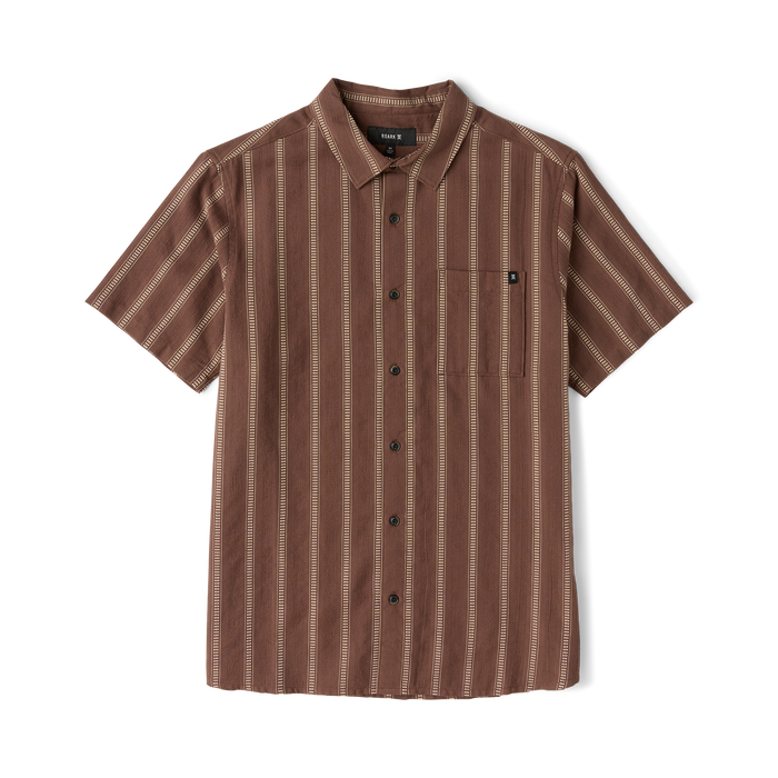 Roark Crosswinds button up shirt in coco bean brown with vertical tan stripe pattern, displayed flat lay on white background