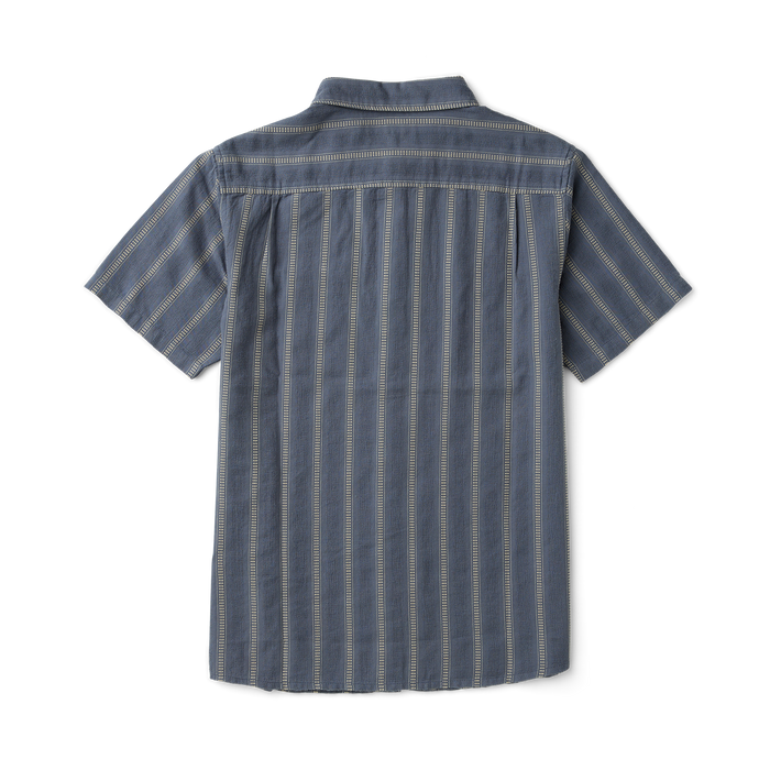 Close-up of a Roark active shirt featuring durable buttons, perfect for adventure and outdoor activities, in a neutral color palette.
