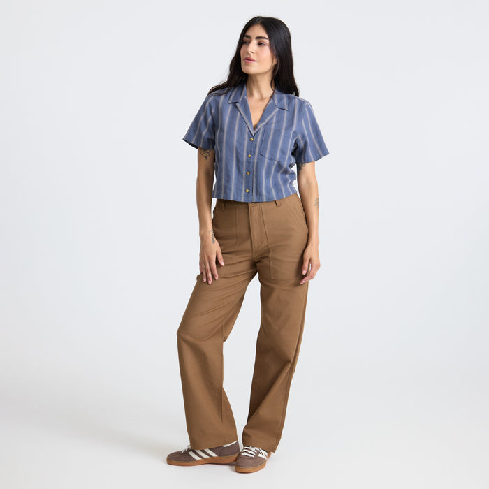 Close-up of a stylish shirt featuring detailed collar, waist, buttons, and pocket design, perfect for adventure and travel.