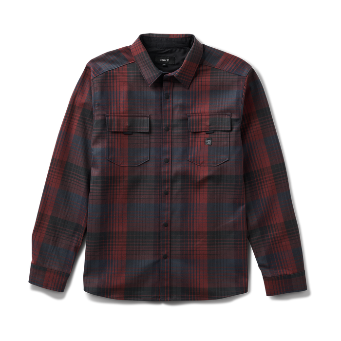 Stylish Roark plaid dress shirt featuring tartan design and pocket, perfect for adventure and outdoor settings