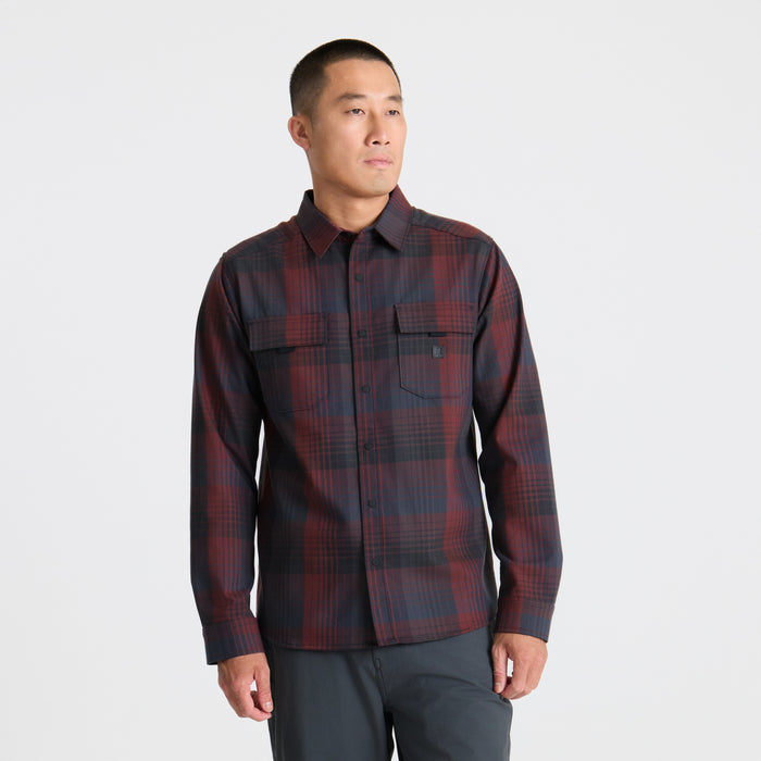 Adventure-ready Roark gear in a scenic outdoor setting, perfect for exploring and travel.