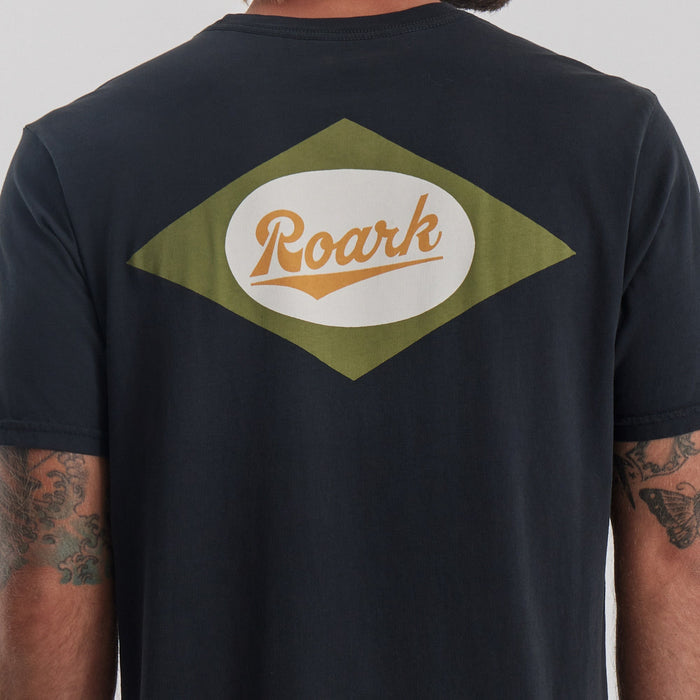 Roark Diamond Script Premium Tee in Black: Front view, showcasing a model wearing it.