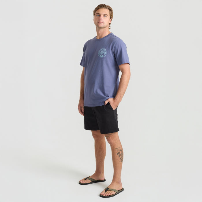 Outdoor adventure apparel with blue short-sleeve shirt and coordinating shorts, perfect for travel and exploring.