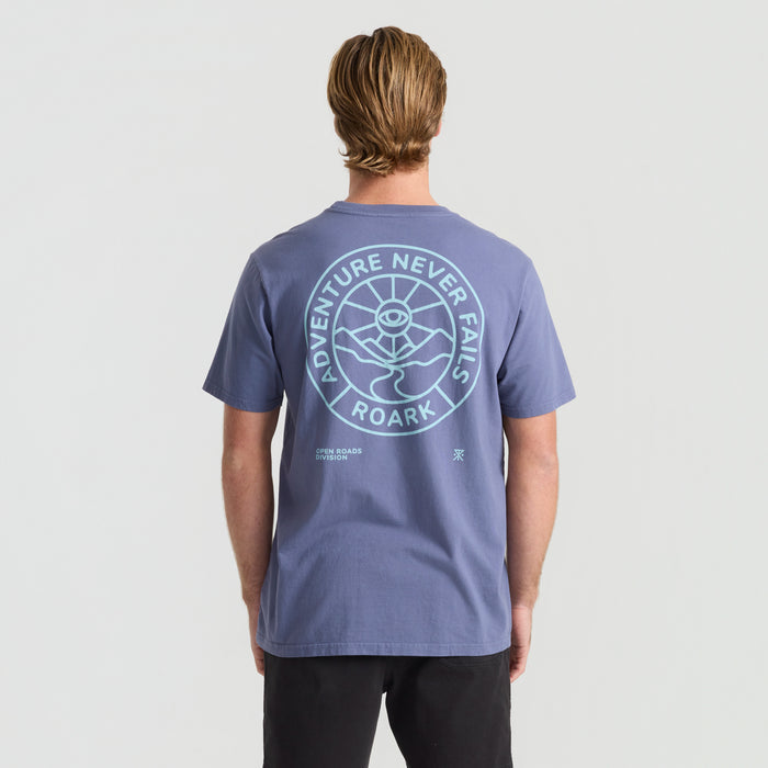 Active shirt designed for adventure and travel by Roark, featured in natural outdoor setting
