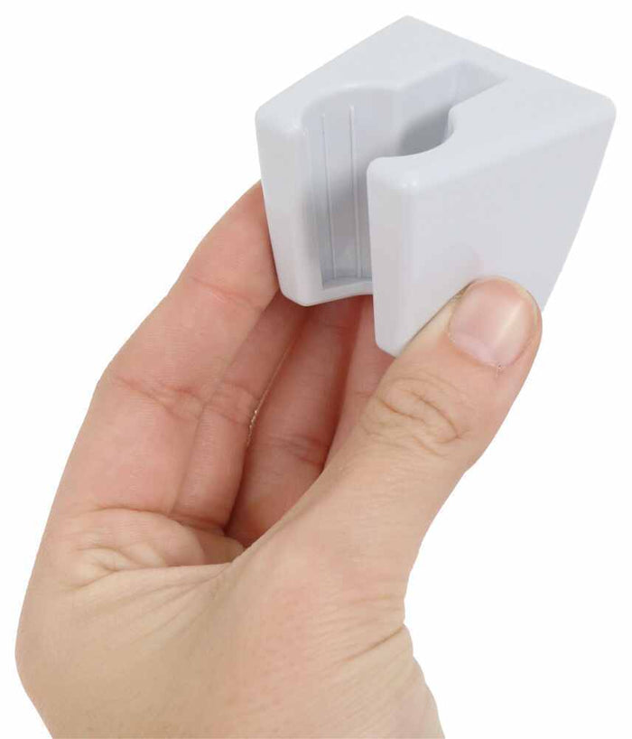 White Toilet Spray Holder Mount in Hand - Size Detail | United RV Parts