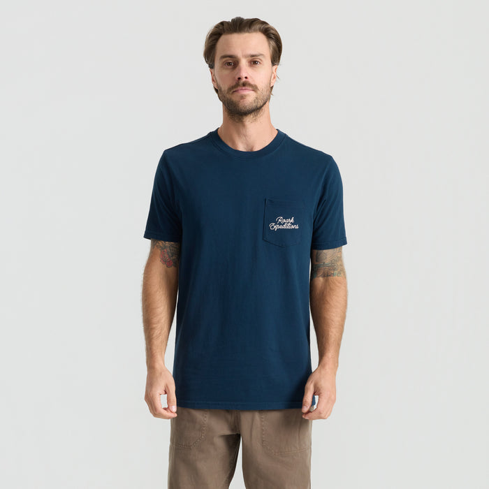 Active shirt with palm tree pattern from Roark's collection, blending travel and outdoor adventure style.