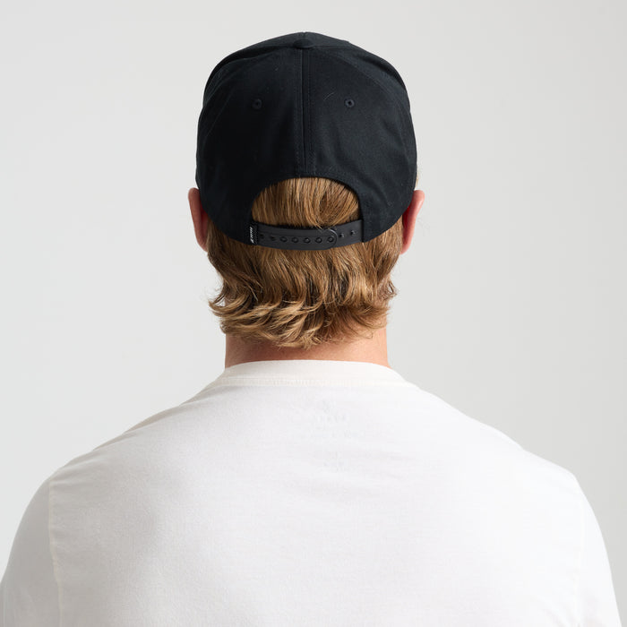 Stylish black baseball cap from Roark, perfect for outdoor adventures and travel.