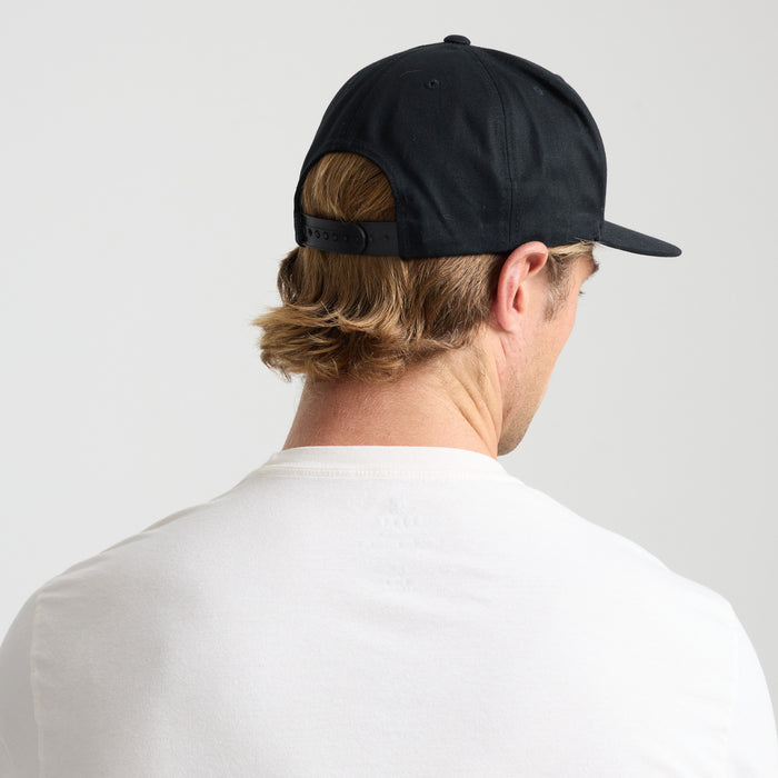 Stylish black headgear designed for adventure and travel by Roark