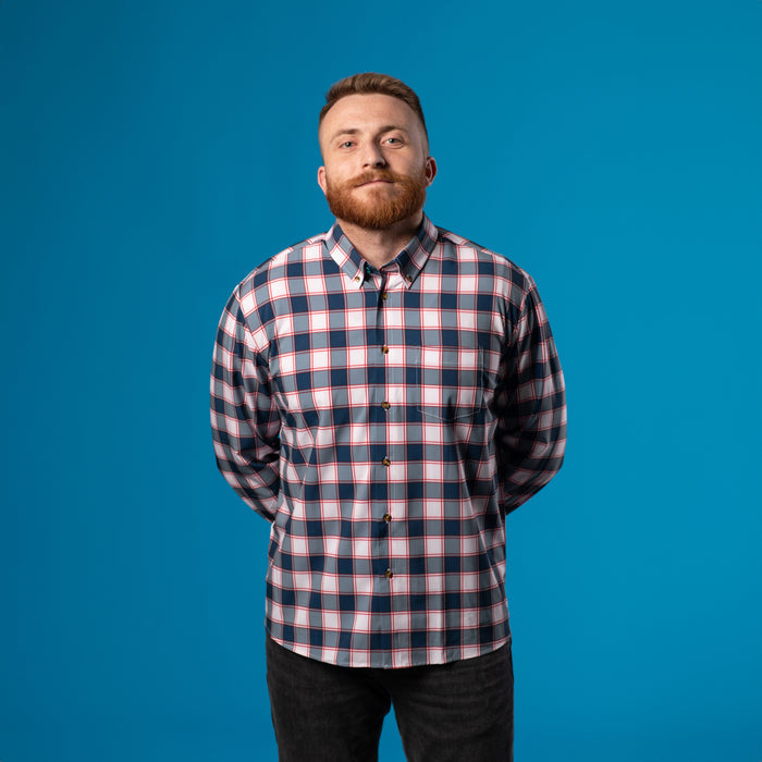 Man wearing White and Navy shirt w/ Red Accents