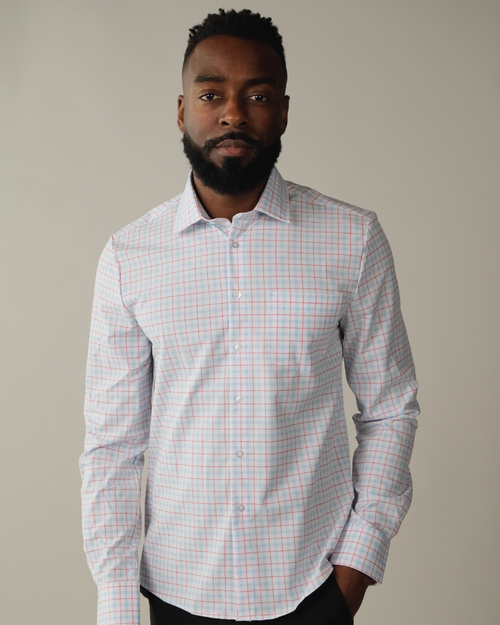 Man wearing white with Red and Blue Windowpane shirt