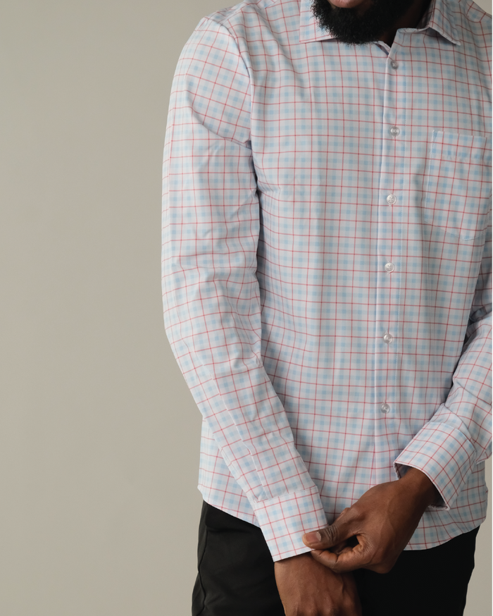Man wearing white with Red and Blue Windowpane shirt