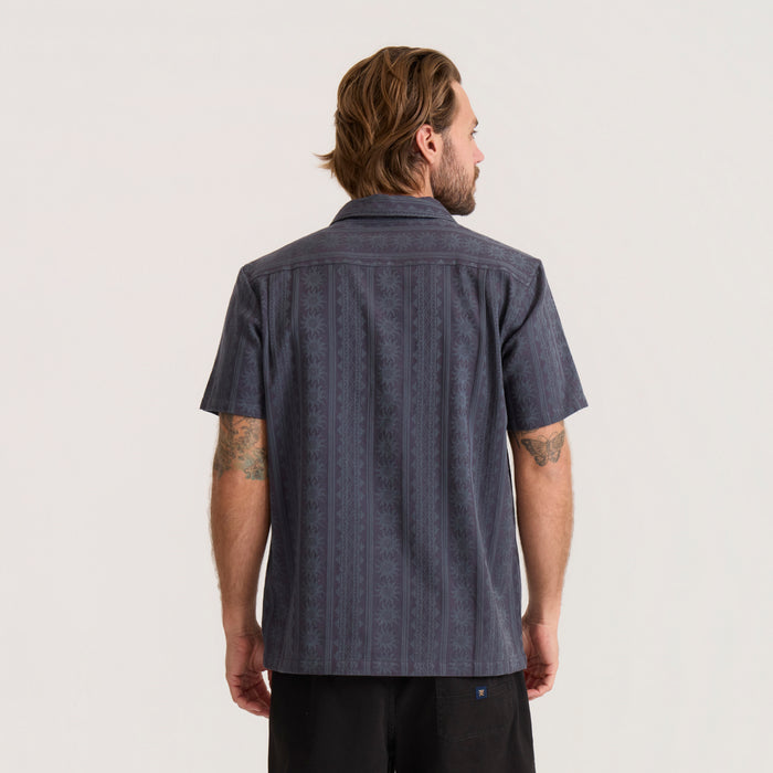 Charcoal gray short sleeve button-up shirt with vertical jacquard pattern, shown on male model from back view