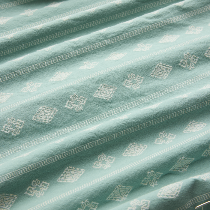Artistic textile display featuring intricate motifs, perfect for creative and adventurous settings