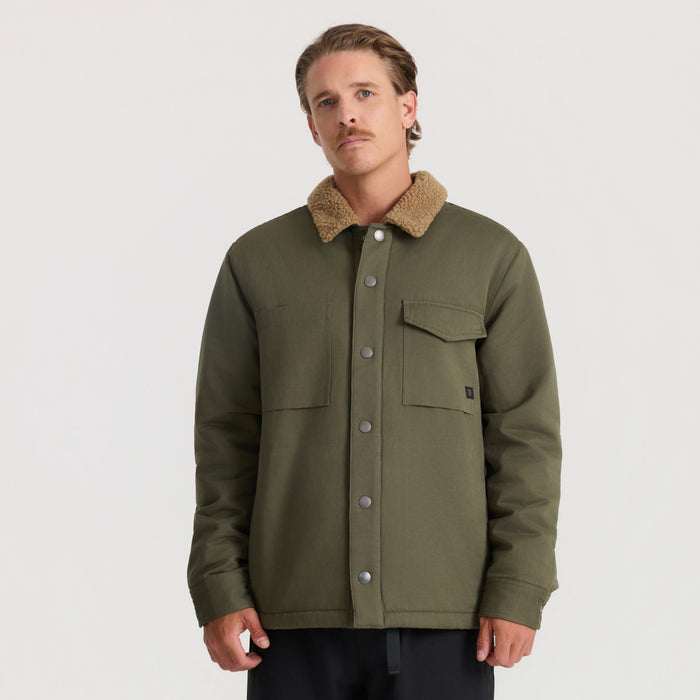 Hebrides 2.0 Sherpa Jacket in military green with tan sherpa collar, worn by model on neutral background