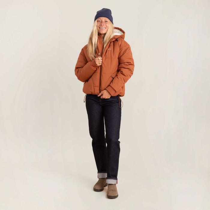 Roark Hokkaido Puffer Jacket in Coconut Shell, showcasing a front view with a model wearing it.