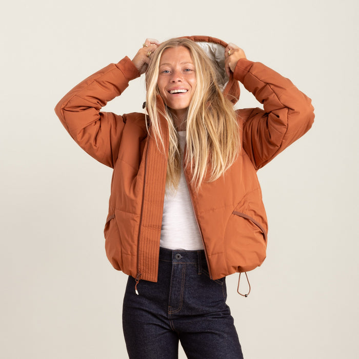 Roark Hokkaido Puffer Jacket in Coconut Shell, showcasing a back view with a model wearing it.