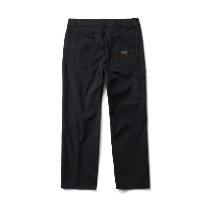Close-up of a black denim pocket detailing on Roark adventure gear, emphasizing durability and travel-ready design.
