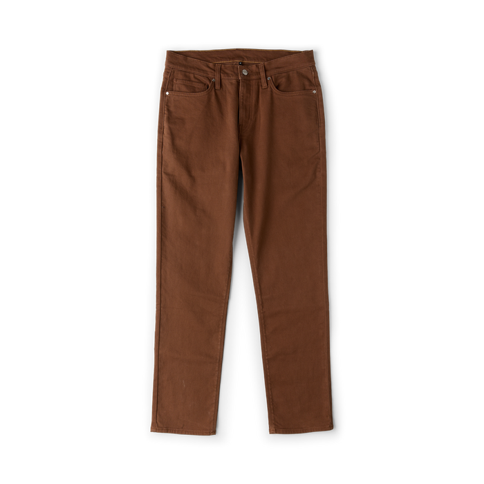 HWY 128 five-pocket rust brown broken twill denim jeans displayed flat against white background