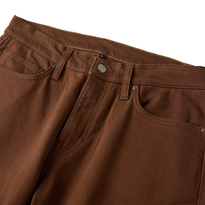 HWY 128 5-pocket Broken Twill Denim jeans in rust brown, flat lay detail showing waistband and metal button closure