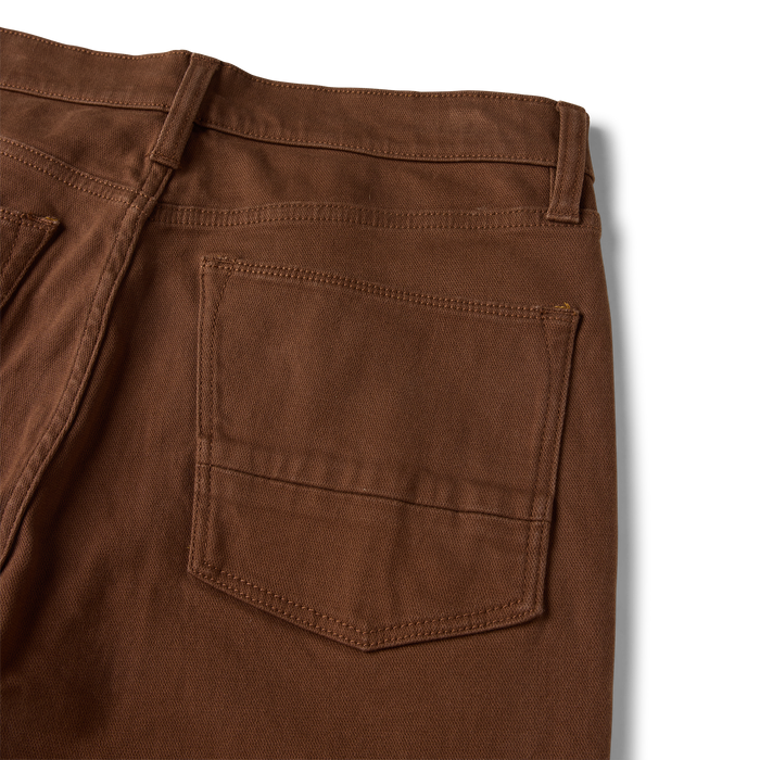 HWY 128 five-pocket rust brown broken twill denim jeans, detail view showing back pocket and waistband construction