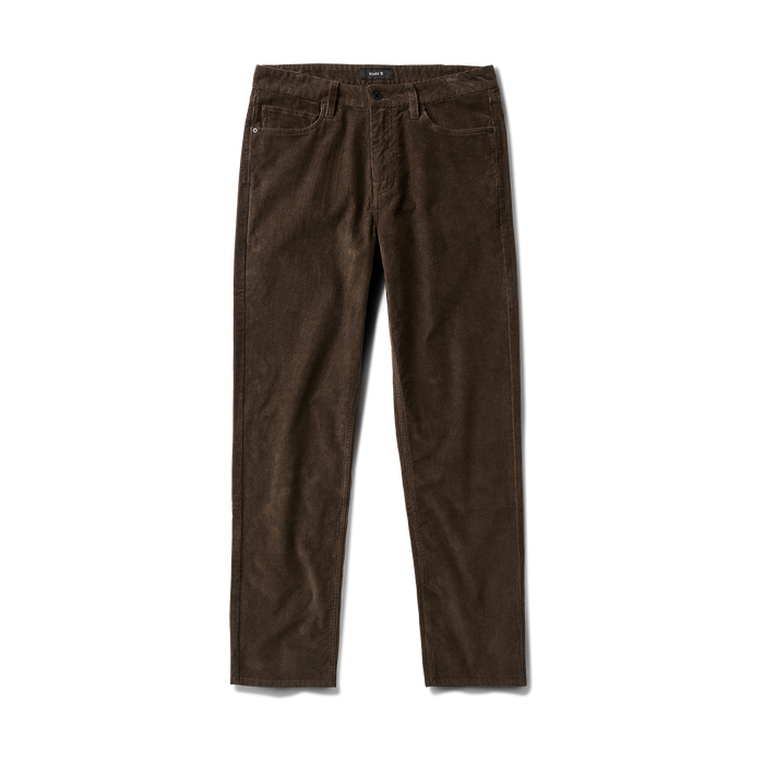 Close-up of a brown denim pocket on a durable adventure-ready garment, perfect for travel and outdoor activities.