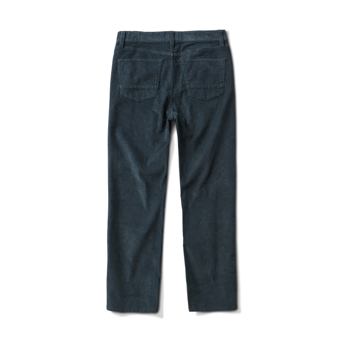 Close-up of durable denim jeans featuring detailed stitching, a sturdy button, and a deep pocket, perfect for adventure and travel.