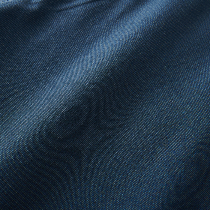 Fabric detail of navy hybrid shorts showcasing its smooth texture and high-quality material.