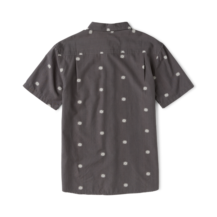 Charcoal Journey short sleeve button up shirt with white daisy flower print, shown flat lay from back view against white background