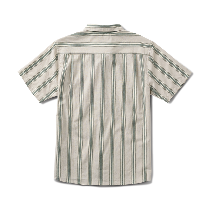 Durable dress shirt featuring rugged buttons and collar, perfect for adventure and travel