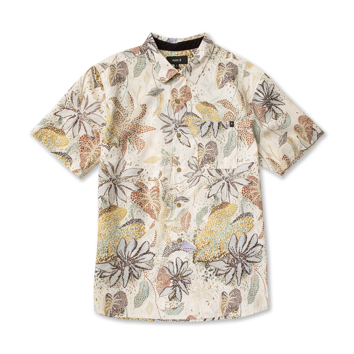 Ivory short sleeve button up shirt with botanical leaf and flower print in tan, rust, and green tones