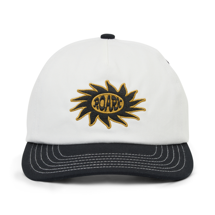 White and black snapback hat featuring embroidered sun logo with yellow and black Roark text in center