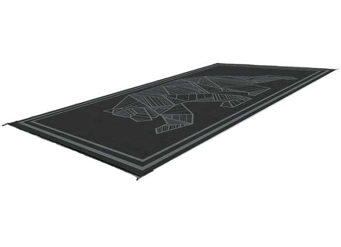Black Kuma Bear Outdoor RV Mat 18x9 - Angled View Showing Full Size and Geometric Bear Design | United RV Parts