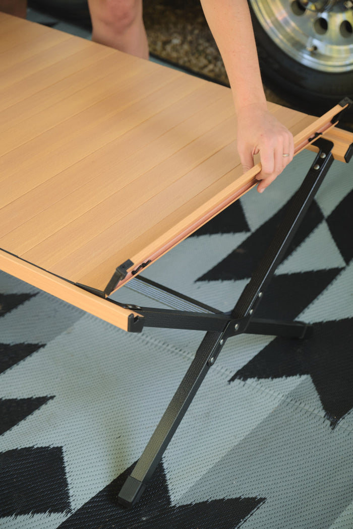 Kuma Camp Crew Coffee Table Bamboo Slat Top and Black X-Frame - Setup Detail | United RV Parts
