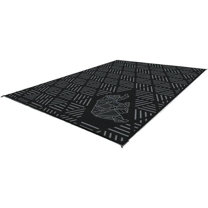 Black Grey Kuma Striped Peaks Outdoor RV Mat 12x9 - Angled View with Bear Logo | United RV Parts