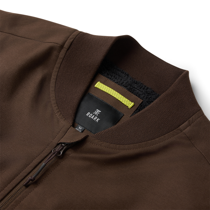 Layover Bomber Jacket in tobacco brown with ribbed neckline, lime accent stripe, and full zip front detail shot