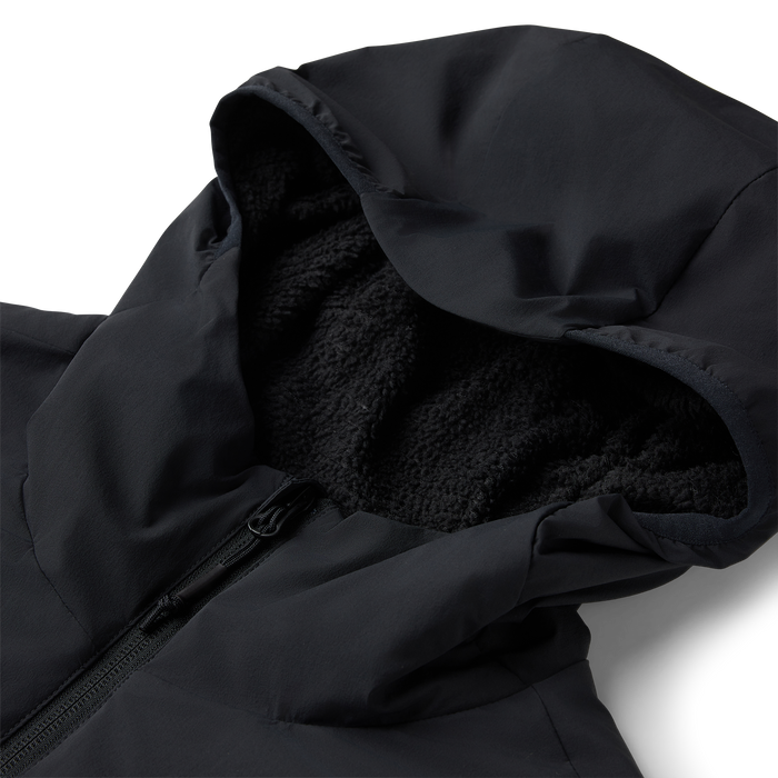 Black Layover Jacket with hood open showing fleece-lined interior and front zipper detail