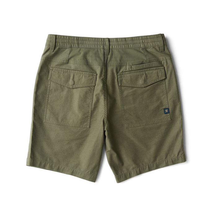 Olive green Layover Pro 8" Traveler Shorts displayed flat lay from back view showing large cargo pockets and brand logo