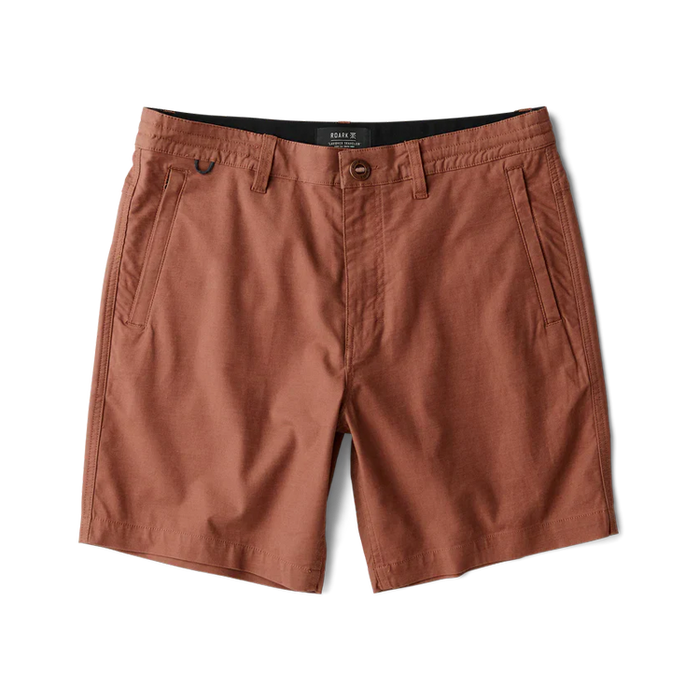 Roark Layover Pro 8" Traveler Shorts in red clay, flat lay shot showing front pockets and button closure