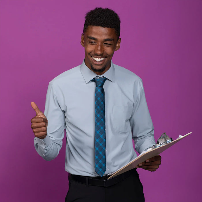 Blue plaid tie on blue shirt.